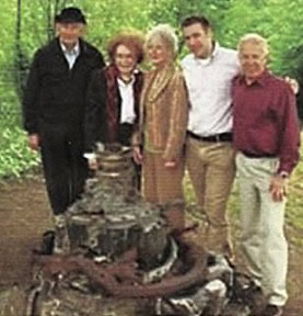 jim Mcphee and friends with the engine from his plane