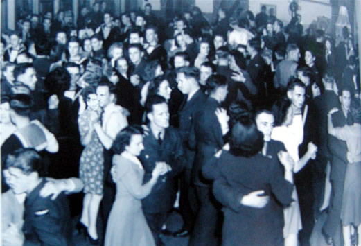 young Canadians dancing with airmen